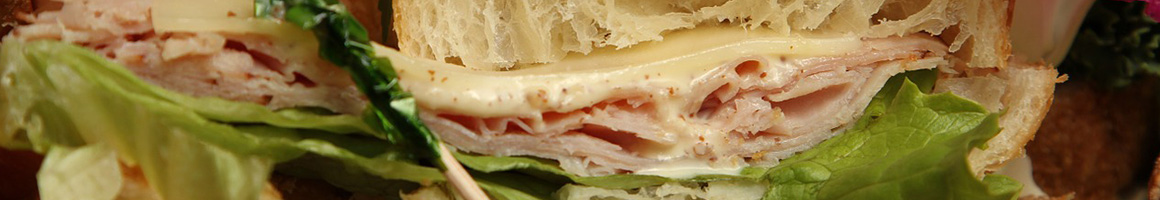 Eating Breakfast & Brunch Sandwich at Bagel Factory 2 restaurant in Myrtle Beach, SC.
